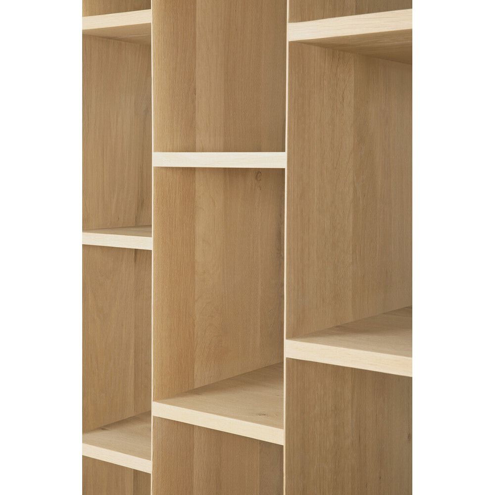 An angular composition, designed by Alain van Havre, forms the heart of a design that aims to distance itself from traditional static and immobile surfaces. By perfectly aligning multiple angles, a unique sense of volume is created. When we then add light to the equation, the multi-faceted oak canvas creates even more depth by casting shadows. Amethyst Home provides interior design, new home construction design consulting, vintage area rugs, and lighting in the Austin metro area.