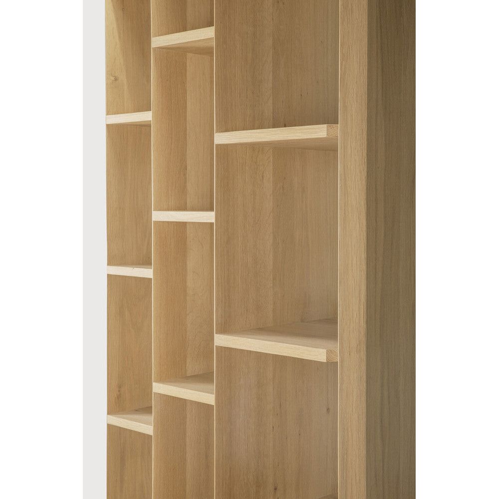 An angular composition, designed by Alain van Havre, forms the heart of a design that aims to distance itself from traditional static and immobile surfaces. By perfectly aligning multiple angles, a unique sense of volume is created. When we then add light to the equation, the multi-faceted oak canvas creates even more depth by casting shadows. Amethyst Home provides interior design, new home construction design consulting, vintage area rugs, and lighting in the Miami metro area.