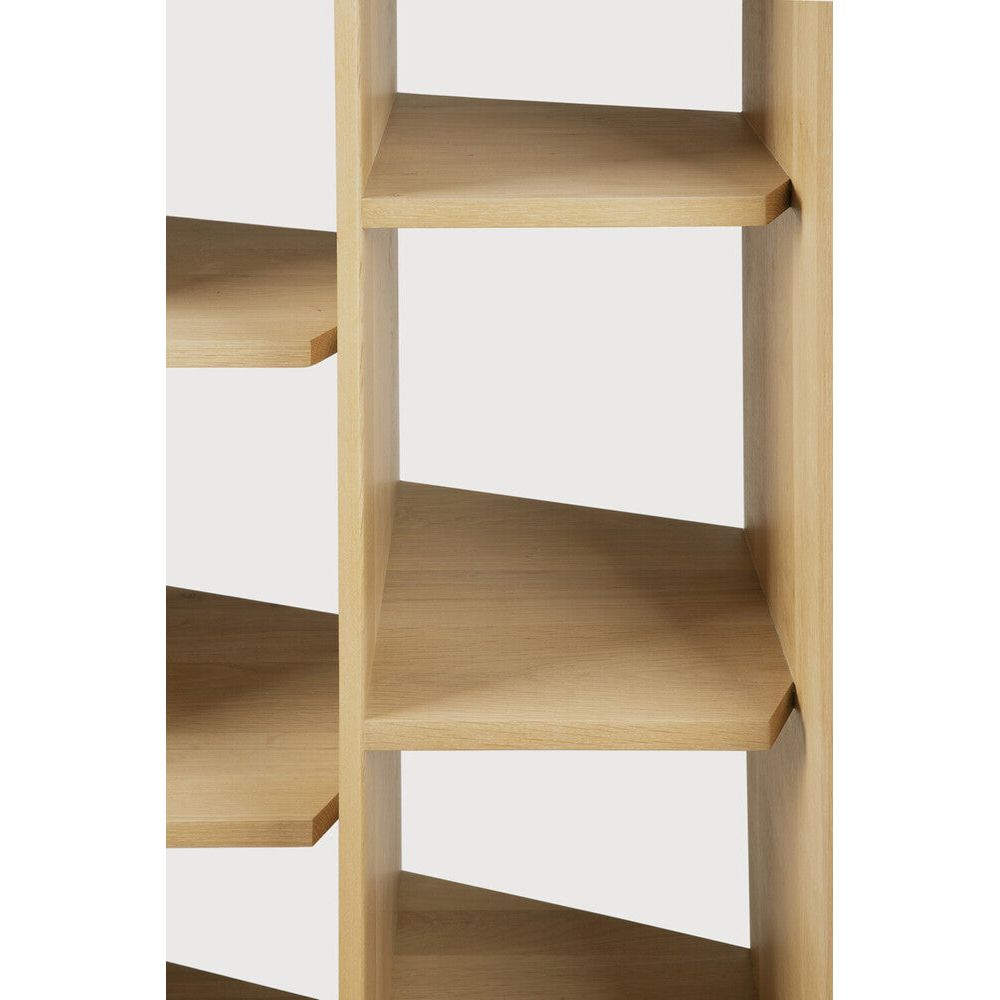 An angular composition, designed by Alain van Havre, forms the heart of a design that aims to distance itself from traditional static and immobile surfaces. By perfectly aligning multiple angles, a unique sense of volume is created. When we then add light to the equation, the multi-faceted oak canvas creates even more depth by casting shadows. Amethyst Home provides interior design, new home construction design consulting, vintage area rugs, and lighting in the Salt Lake City metro area.
