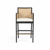 Featuring Antonia Cane Brushed Ebony Bar Stool by Four Hands at Amethyst Home. We love the retro look the cane brings to this Antonia Brushed Ebony Cane Bar Stool. A stunning piece to complete a retro aesthetic in any kitchen or bar area. 
Size: 22"W x 22.50"L x 43"HArm Height from Floor: 37.40" Arm Height from Seat: 6.10" Arm Length: 18.90" Arm Width.  Amethyst Home provides interior design, new home construction design consulting, vintage area rugs, and lighting in the Salt Lake City metro area.