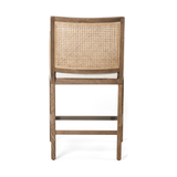 Featuring Antonia Counter Stool - Toasted Nettlewood by Four Hands at Amethyst Home. We love the retro look the cane brings to this Antonia Counter Stool in Toasted Nettlewood. A stunning piece to complete a retro or boho aesthetic in any kitchen or bar area.
Counter Stool Overall Dimensions:  22"W x 22.50"L x 39"HColors: Light Natural Cane, Toasted Pa.  Amethyst Home provides interior design, new home construction design consulting, vintage area rugs, and lighting in the Newport Beach metro area.