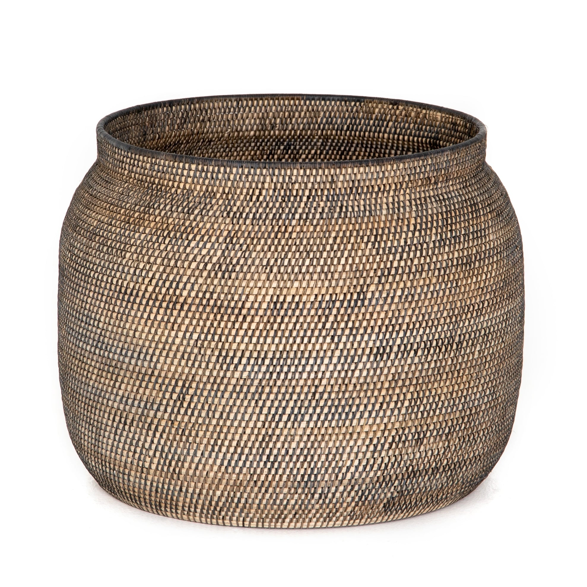 This Ansel Contrast Black Basket is woven from natural Lombok and black rattan, bringing a gorgeous color and texture to the basket. A large, stylish basket to store your pet toys, blankets, or other items around the home.   Overall Dimensions: 24.00"w x 24.00"d x 18.50"h Colors: Natural Lombok Weave, Black Rattan Materials: Lombok, Rattan