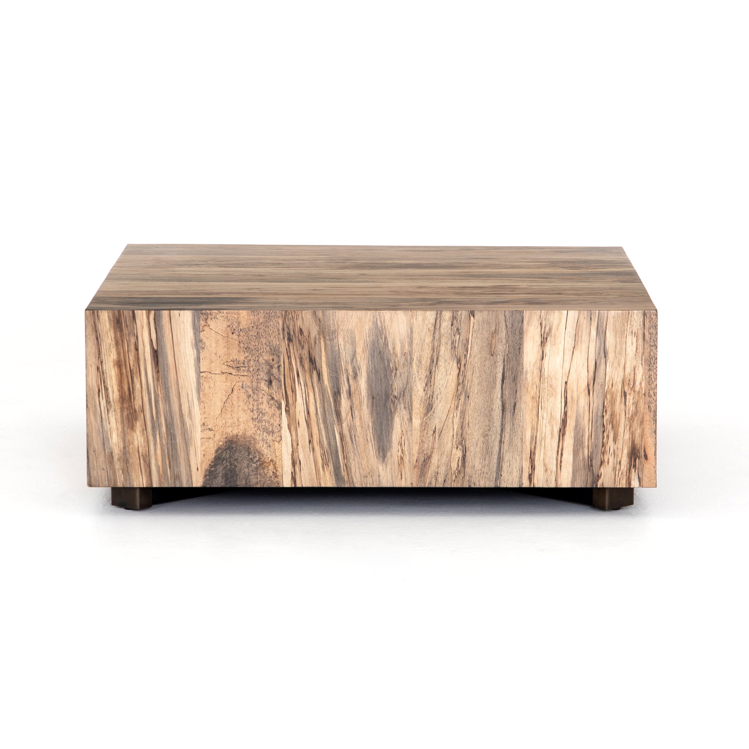 We are obsessed with the spalted pimavera coloring of this Hudson Spalted Primavera Square Coffee Table. A stunning piece to add to any living room or loung area. Reflective of woods' natural character, a slight color variance is possible.  Overall Dimensions: 40"w x 40"d x 15"h Materials: Primavera, Iron