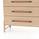 The light-finished oak of this Rosedale 6 Drawer Tall Dresser brings a clean, brightness to any room. With four large drawers and two smaller drawers, this is a functional and beautiful piece to add to your bedroom or other area. The iron hardware wrapped in a gorgeous, tan leather really seals the deal!   Overall Dimensions: 36.50"w x 19.50"d x 49.25"h Materials: Oak Veneer, Top Grain Leather, Iron, Solid Oak