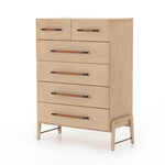 The light-finished oak of this Rosedale 6 Drawer Tall Dresser brings a clean, brightness to any room. With four large drawers and two smaller drawers, this is a functional and beautiful piece to add to your bedroom or other area. The iron hardware wrapped in a gorgeous, tan leather really seals the deal!   Overall Dimensions: 36.50"w x 19.50"d x 49.25"h Materials: Oak Veneer, Top Grain Leather, Iron, Solid Oak