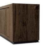 Featuring Abaso Ebony Rustic Wormwood Oak Media Console by Four Hands at Amethyst Home. Made from thick-cut oak veneer with a faux rustic finish made to emulate wormwood, this spacious media console features chunky squared legs and dovetail joinery detailing.Overall Dimensions: 94.50"W x 19.75"L x 27"HColors: Black Mdf, Ebony Rustic Wormwood Oak, Black Plywoo. Amethyst Home provides interior design, new home construction design consulting, vintage area rugs, and lighting in the Houston metro area.