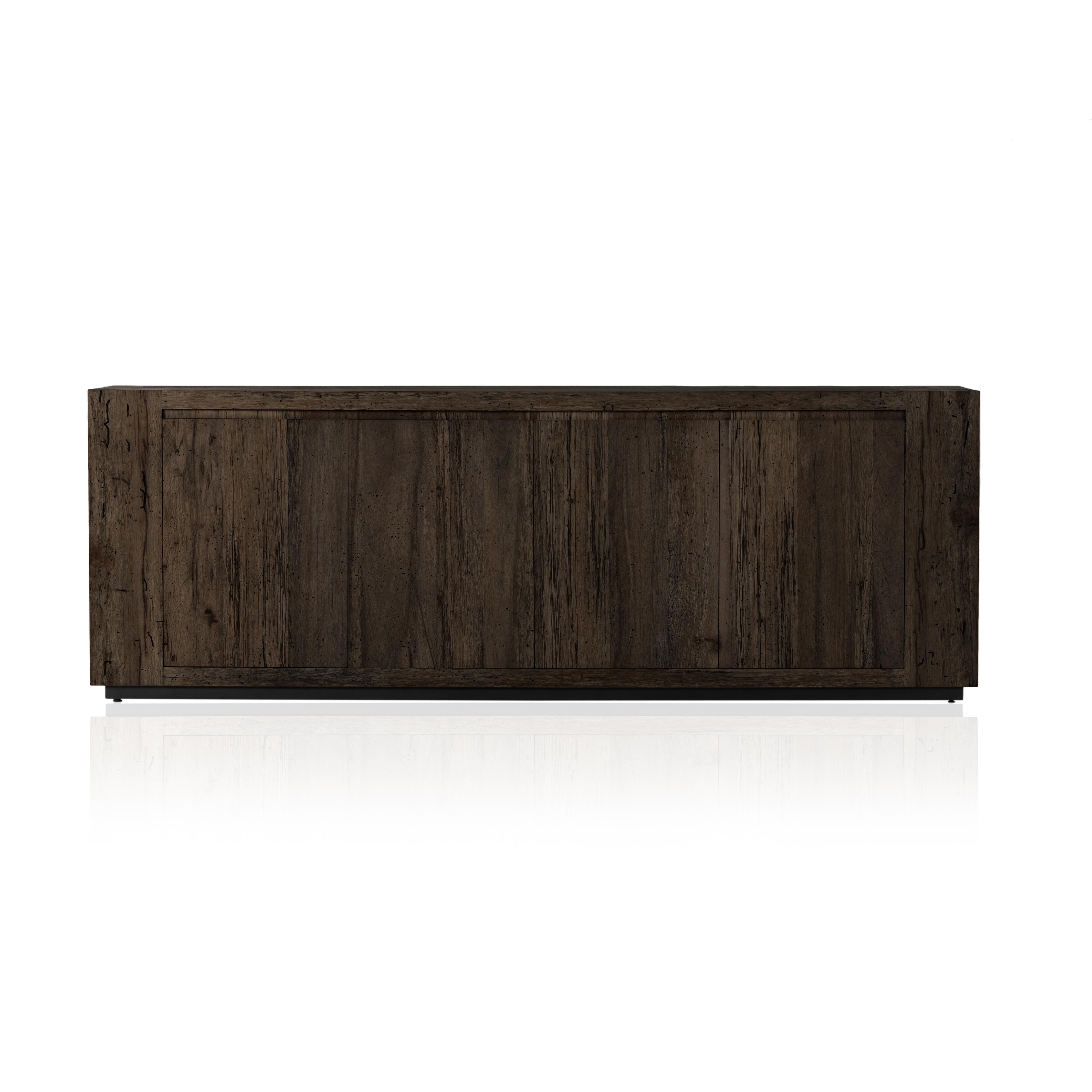 Made from thick-cut oak veneer with a faux rustic finish made to emulate wormwood, this low, large-scale sideboard features chunky squared legs and dovetail joinery detailing. Amethyst Home provides interior design, new home construction design consulting, vintage area rugs, and lighting in the Dallas metro area.