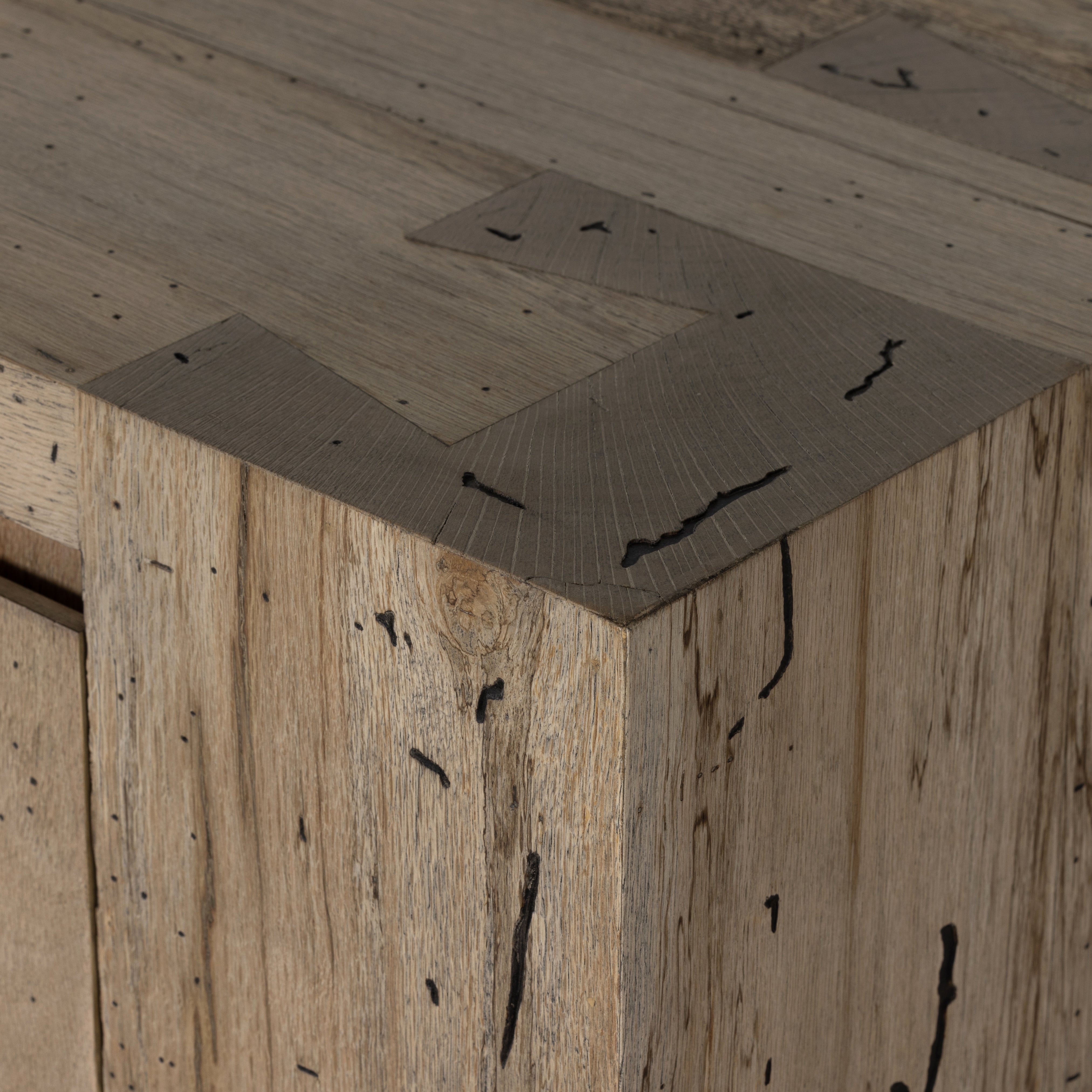 Made from thick-cut oak veneer with a faux rustic finish made to emulate wormwood, this low, large-scale sideboard features chunky squared legs and dovetail joinery detailing. Amethyst Home provides interior design, new home construction design consulting, vintage area rugs, and lighting in the Nashville metro area.