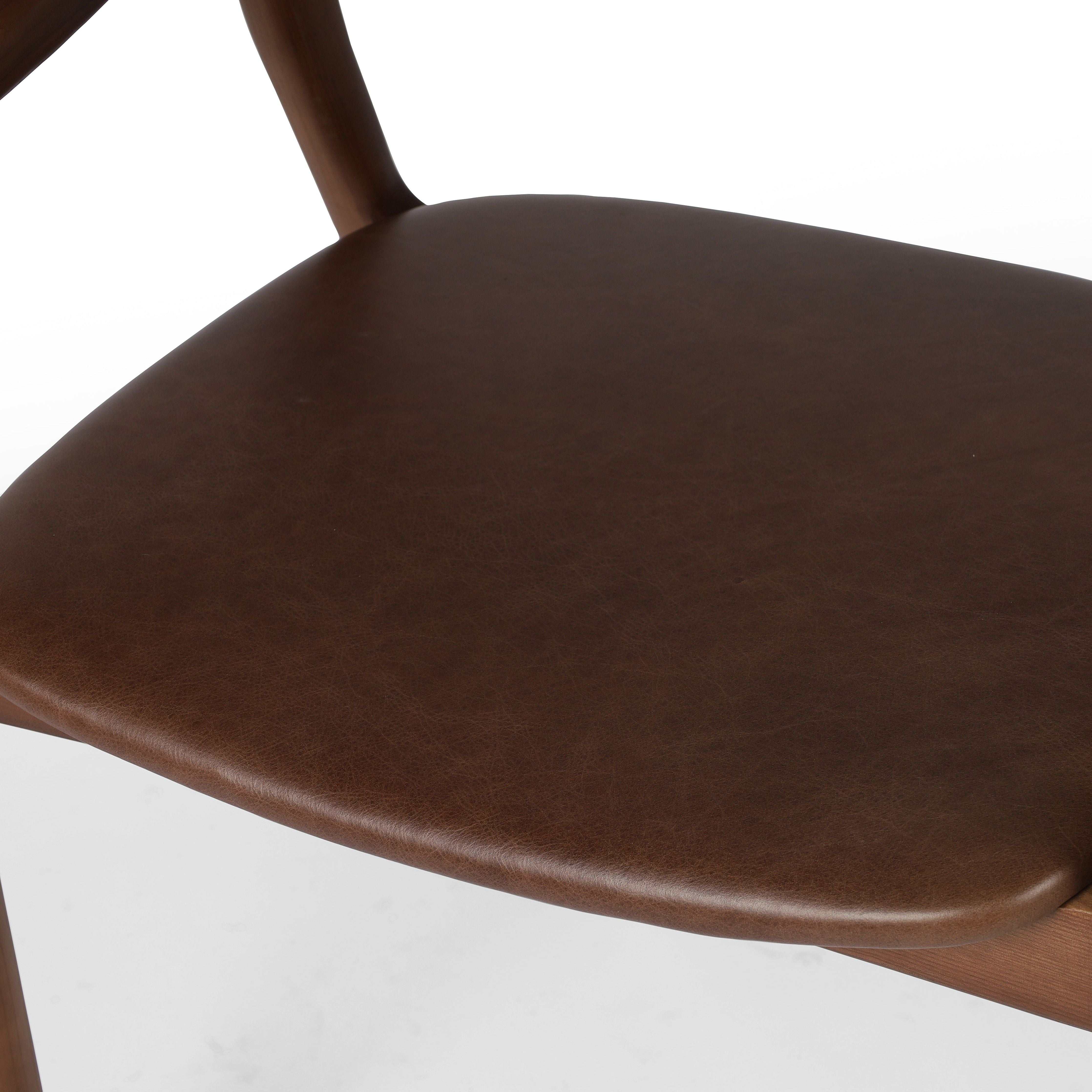 Featuring Amare Sonoma Coco Dining Armchair by Four Hands at Amethyst Home. Make it monochromatic. Inspired by simple Scandinavian styling, solid ash forms a shapely open frame for top-grain leather seating.
Overall Dimensions: 22"W x 22"L x 32"HColors: Umber Ash , Sonoma CocoMaterials: Solid Ash , Top Grain LeatherWeight: 13.89
Seat Depth: 17.25"Seat Height: 19"Arm Height from Floor:. Amethyst Home provides interior design, new construction, custom furniture and area rugs in the Austin metro area