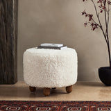 Featuring Aniston Andes Natural Ottoman by Four Hands at Amethyst Home. Place this round Aniston Andes Natural Ottoman just about anywhere for a subtle retro vibe. Upholstered in a faux Mongolian shearling with a high pile fur. Parawood legs are wirebrushed for a warm, vintage feel.
Overall Dimensions: 22.50"W x 22.50"L x 20.50"HWeight: 17.64 lbsVolume: 5.4 cu ft. Amethyst Home provides interior design services, furniture, rugs, and lighting in the Salt Lake City metro area.