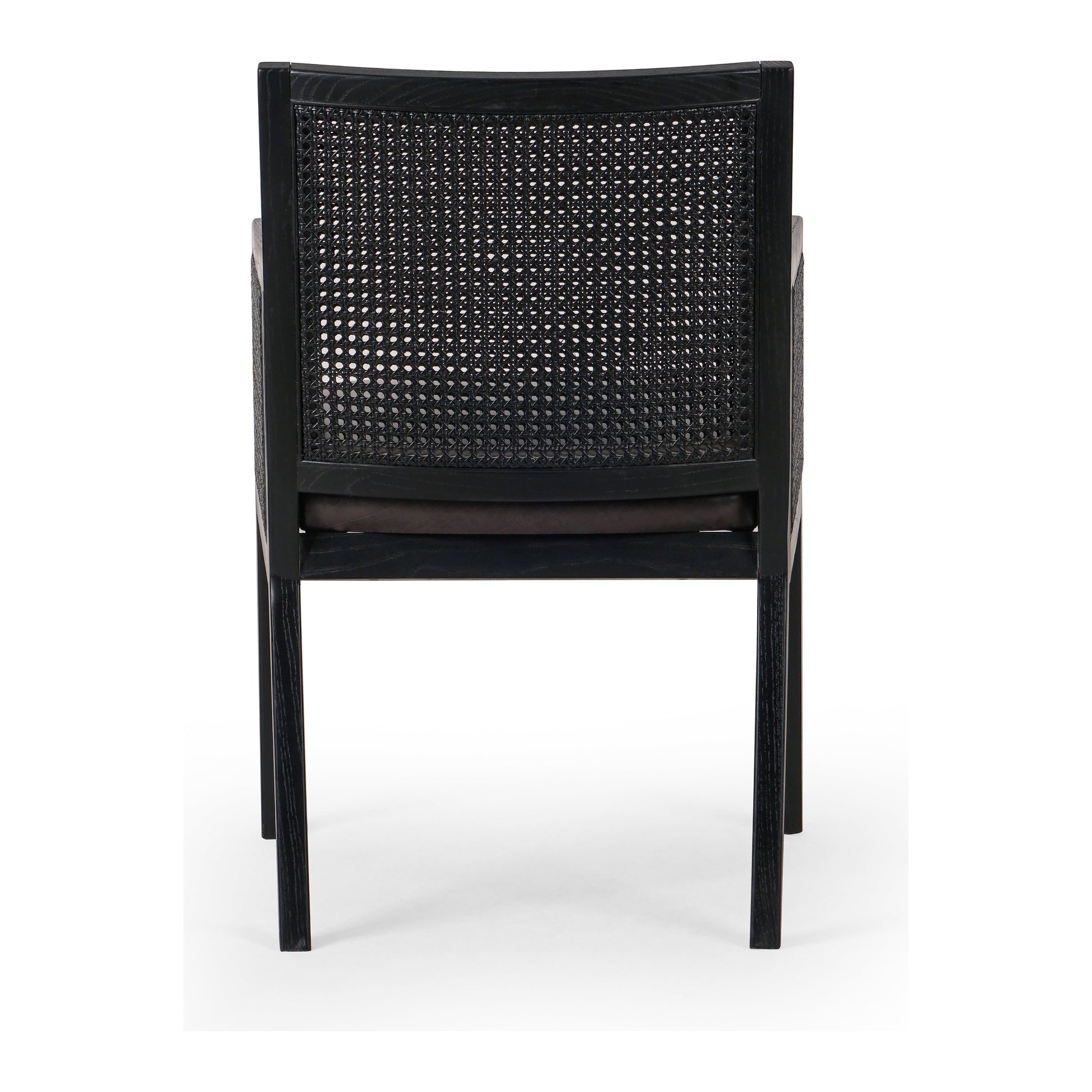 Ebony-brushed parawood frames a textural cane inlay, with top-grain leather seating in a chic black. Amethyst Home provides interior design, new construction, custom furniture, and area rugs in the Los Angeles metro area.