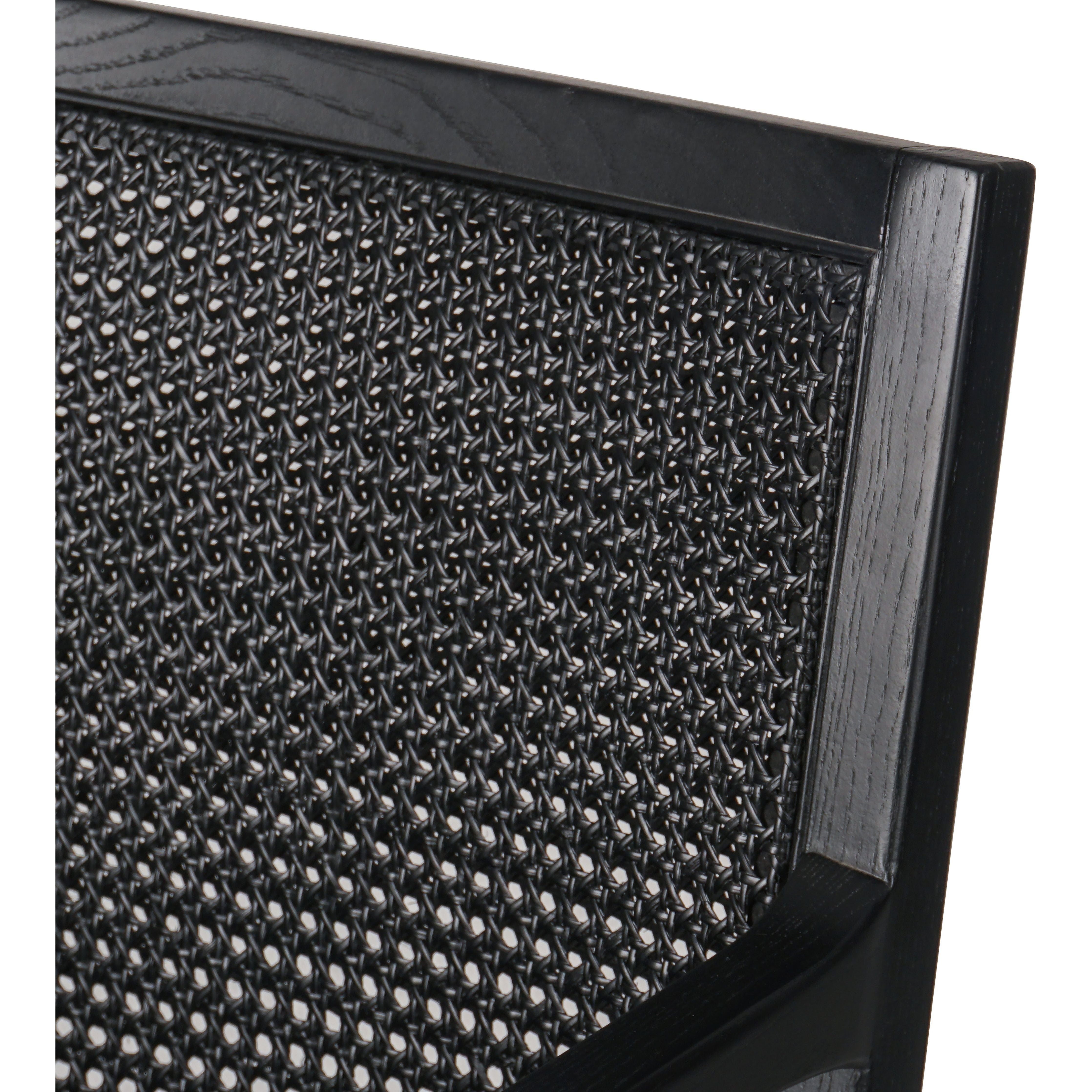 Ebony-brushed parawood frames a textural cane inlay, with top-grain leather seating in a chic black. Amethyst Home provides interior design, new construction, custom furniture, and area rugs in the Omaha metro area.