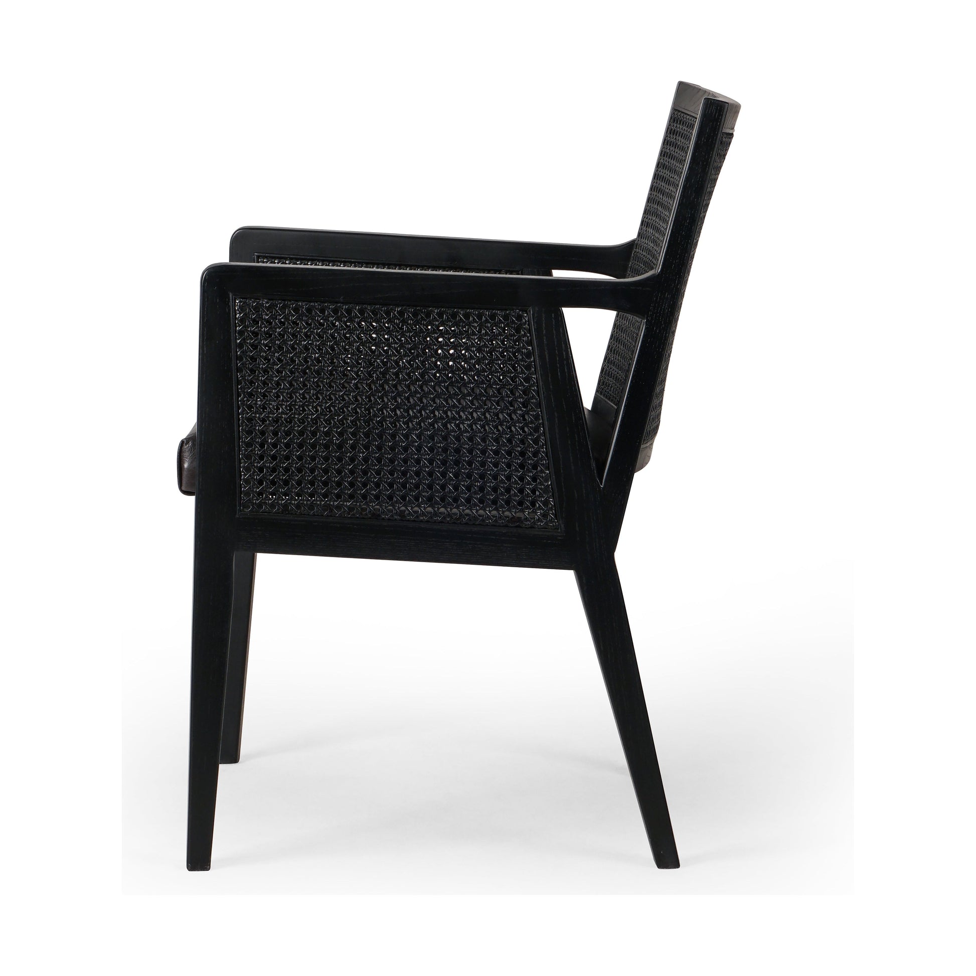 Ebony-brushed parawood frames a textural cane inlay, with top-grain leather seating in a chic black. Amethyst Home provides interior design, new construction, custom furniture, and area rugs in the Scottsdale metro area.