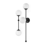 Featuring Armstrong Black Gunmetal Opal Matte Glass 4 L Sconce by Four Hands at Amethyst Home. Matte glass spheres seem to extend and reach across smooth brass rods. Each globe is individually blown, shaped and sculpted by hand through a one-hour process. Matte globes are specially manufactured to evenly diffuse light. The finish on the brass frame is achieved. Amethyst Home provides interior design, new home construction design consulting, vintage area rugs, and lighting in the Dallas metro area.