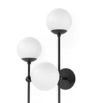 Featuring Armstrong Black Gunmetal Opal Matte Glass 4 L Sconce by Four Hands at Amethyst Home. Matte glass spheres seem to extend and reach across smooth brass rods. Each globe is individually blown, shaped and sculpted by hand through a one-hour process. Matte globes are specially manufactured to evenly diffuse light. The finish on the brass frame is achi. Amethyst Home provides interior design, new home construction design consulting, vintage area rugs, and lighting in the Scottsdale metro area.