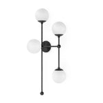 Featuring Armstrong Black Gunmetal Opal Matte Glass 4 R Sconce by Four Hands at Amethyst Home. Matte glass spheres seem to extend and reach across smooth brass rods. Each globe is individually blown, shaped and sculpted by hand through a one-hour process. Matte globes are specially manufactured to evenly diffuse light. The finish on the brass frame is achieved. Amethyst Home provides interior design, new home construction design consulting, vintage area rugs, and lighting in the Boston metro area.