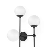 Featuring Armstrong Black Gunmetal Opal Matte Glass 4 R Sconce by Four Hands at Amethyst Home. Matte glass spheres seem to extend and reach across smooth brass rods. Each globe is individually blown, shaped and sculpted by hand through a one-hour process. Matte globes are specially manufactured to evenly diffuse light. The finish on the brass frame is achie. Amethyst Home provides interior design, new home construction design consulting, vintage area rugs, and lighting in the Charlotte metro area.