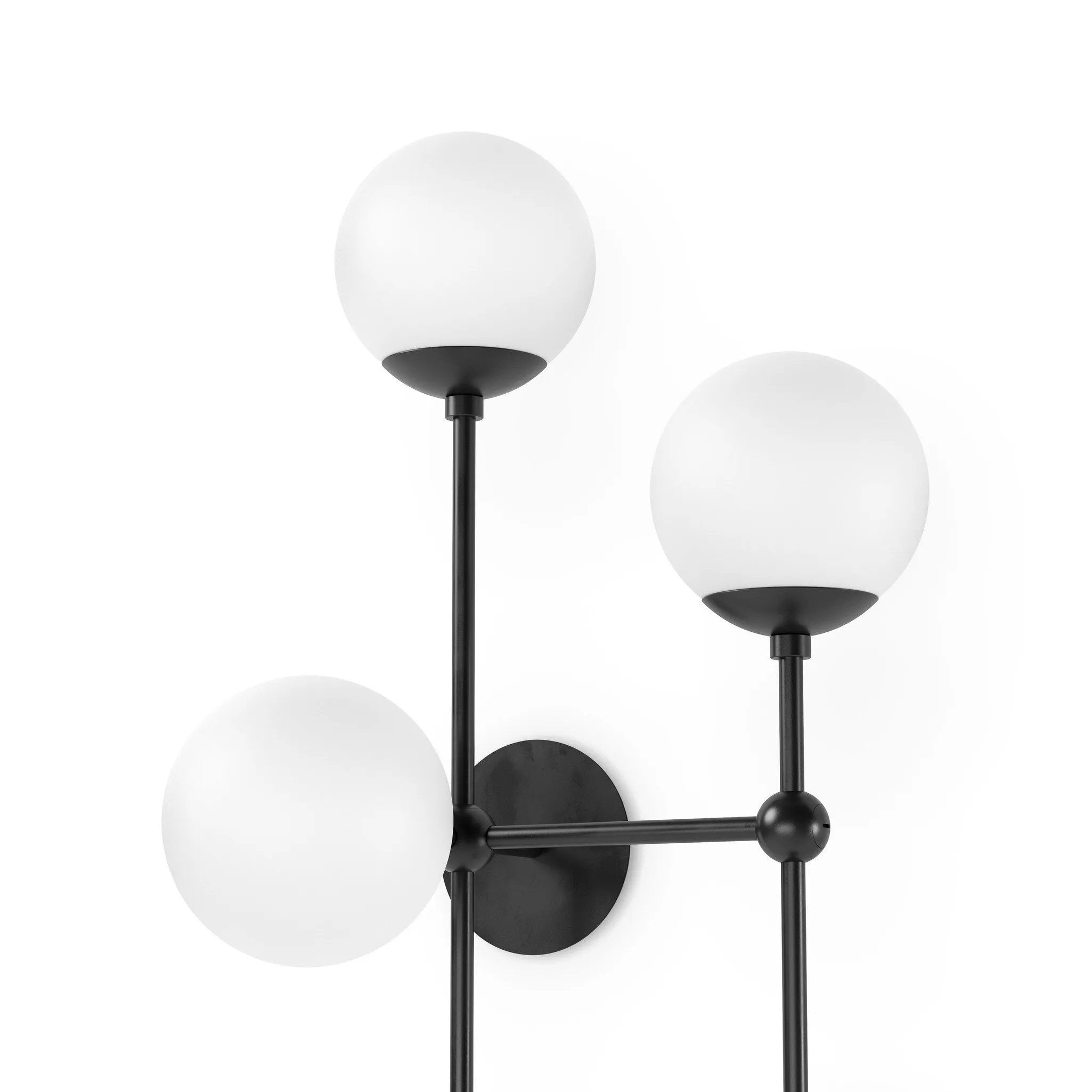Featuring Armstrong Black Gunmetal Opal Matte Glass 4 R Sconce by Four Hands at Amethyst Home. Matte glass spheres seem to extend and reach across smooth brass rods. Each globe is individually blown, shaped and sculpted by hand through a one-hour process. Matte globes are specially manufactured to evenly diffuse light. The finish on the brass frame is achie. Amethyst Home provides interior design, new home construction design consulting, vintage area rugs, and lighting in the Charlotte metro area.