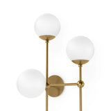 Featuring Armstrong Burnished Brass Opal Matte Glass 4 R Sconce by Four Hands at Amethyst Home. Matte glass spheres seem to extend and reach across smooth brass rods. Each globe is individually blown, shaped and sculpted by hand through a one-hour process. Matte globes are specially manufactured to evenly diffuse light. Brass and glass are 98% recyclable. D. Amethyst Home provides interior design, new home construction design consulting, vintage area rugs, and lighting in the Park City metro area.