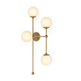 Featuring Armstrong Burnished Brass Opal Matte Glass 4 R Sconce by Four Hands at Amethyst Home. Matte glass spheres seem to extend and reach across smooth brass rods. Each globe is individually blown, shaped and sculpted by hand through a one-hour process. Matte globes are specially manufactured to evenly diffuse light. Brass and glass are 98% recyclable. D. Amethyst Home provides interior design, new home construction design consulting, vintage area rugs, and lighting in the San Diego metro area.