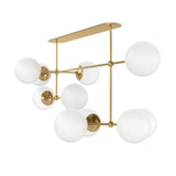 Matte glass spheres seem to extend and reach across smooth brass rods. Each globe is individually blown, shaped and sculpted by hand through a one-hour process. Matte globes are specially manufactured to evenly diffuse light. Brass and glass are 98% recyclable. Designed and sustainably made in Poland by Schwung.Overall Dimensions64.25"w x 30. Amethyst Home provides interior design, new home construction design consulting, vintage area rugs, and lighting in the Austin metro area.