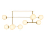 Matte glass spheres seem to extend and reach across smooth brass rods. Each globe is individually blown, shaped and sculpted by hand through a one-hour process. Matte globes are specially manufactured to evenly diffuse light. Brass and glass are 98% recyclable. Designed and sustainably made in Poland by Schwung.Overall Dimensions64.25"w x 30. Amethyst Home provides interior design, new home construction design consulting, vintage area rugs, and lighting in the Winter Garden metro area.