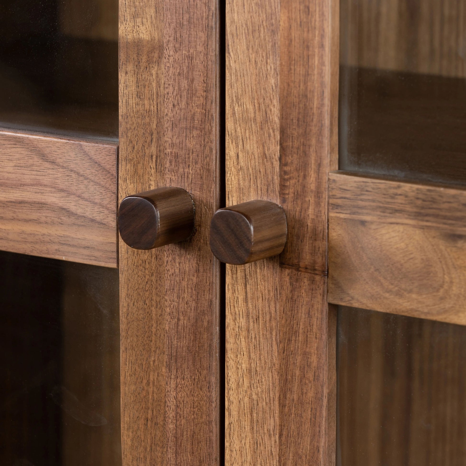 Framed panels, softened corners and tapered spindle legs speak to the vintage European inspiration behind this spacious cabinetry style. Made from natural-finished walnut and walnut veneer Amethyst Home provides interior design, new home construction design consulting, vintage area rugs, and lighting in the Monterey metro area.