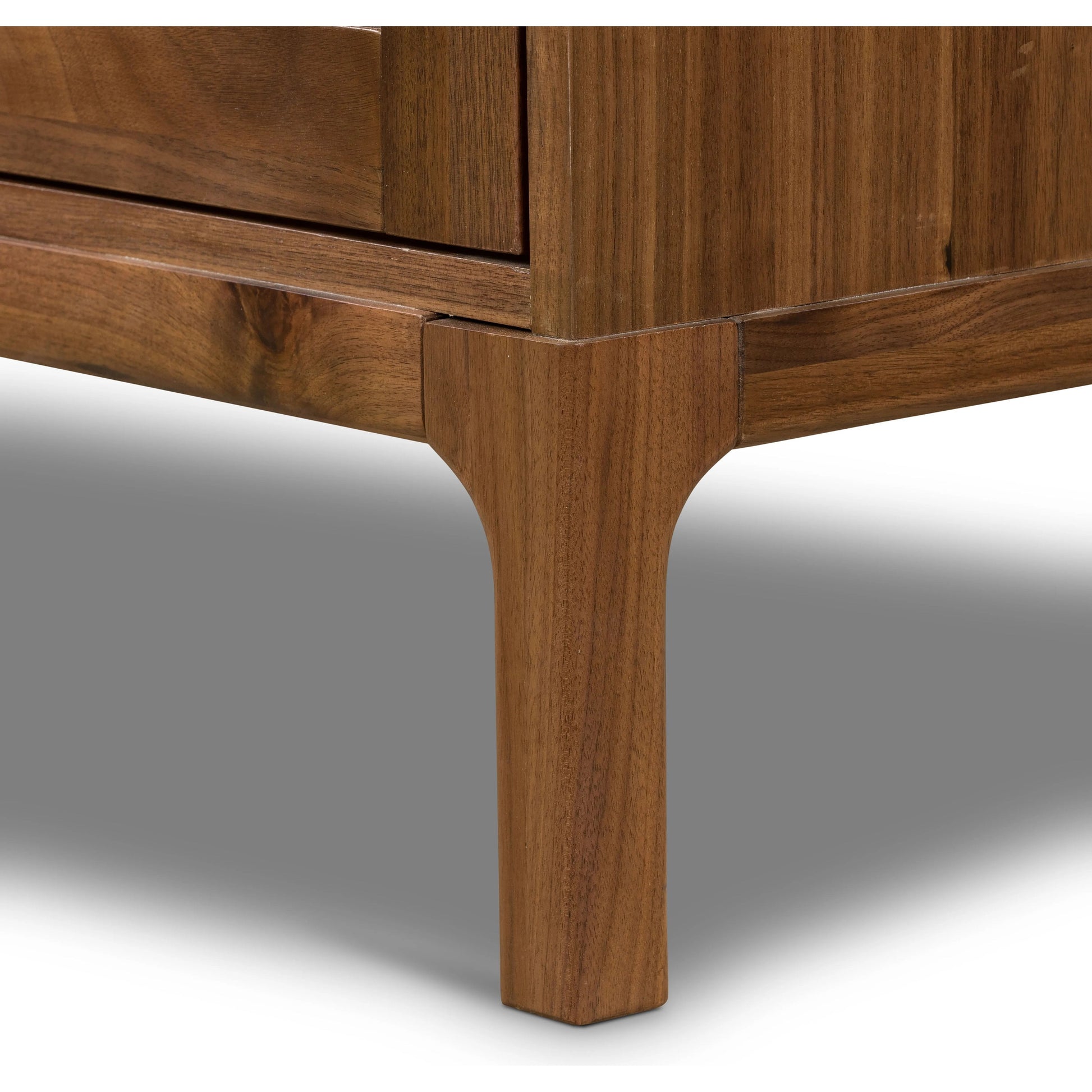 Framed panels, softened corners and tapered spindle legs speak to the vintage European inspiration behind this spacious cabinetry style. Made from natural-finished walnut and walnut veneer Amethyst Home provides interior design, new home construction design consulting, vintage area rugs, and lighting in the Newport Beach metro area.