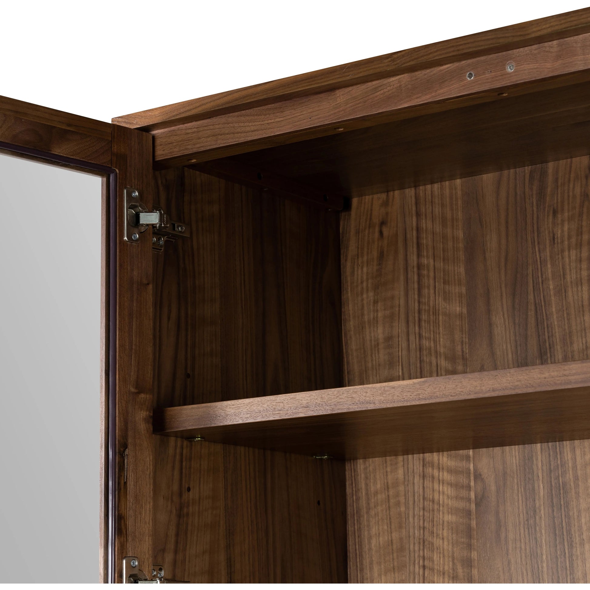 Framed panels, softened corners and tapered spindle legs speak to the vintage European inspiration behind this spacious cabinetry style. Made from natural-finished walnut and walnut veneer Amethyst Home provides interior design, new home construction design consulting, vintage area rugs, and lighting in the Tampa metro area.