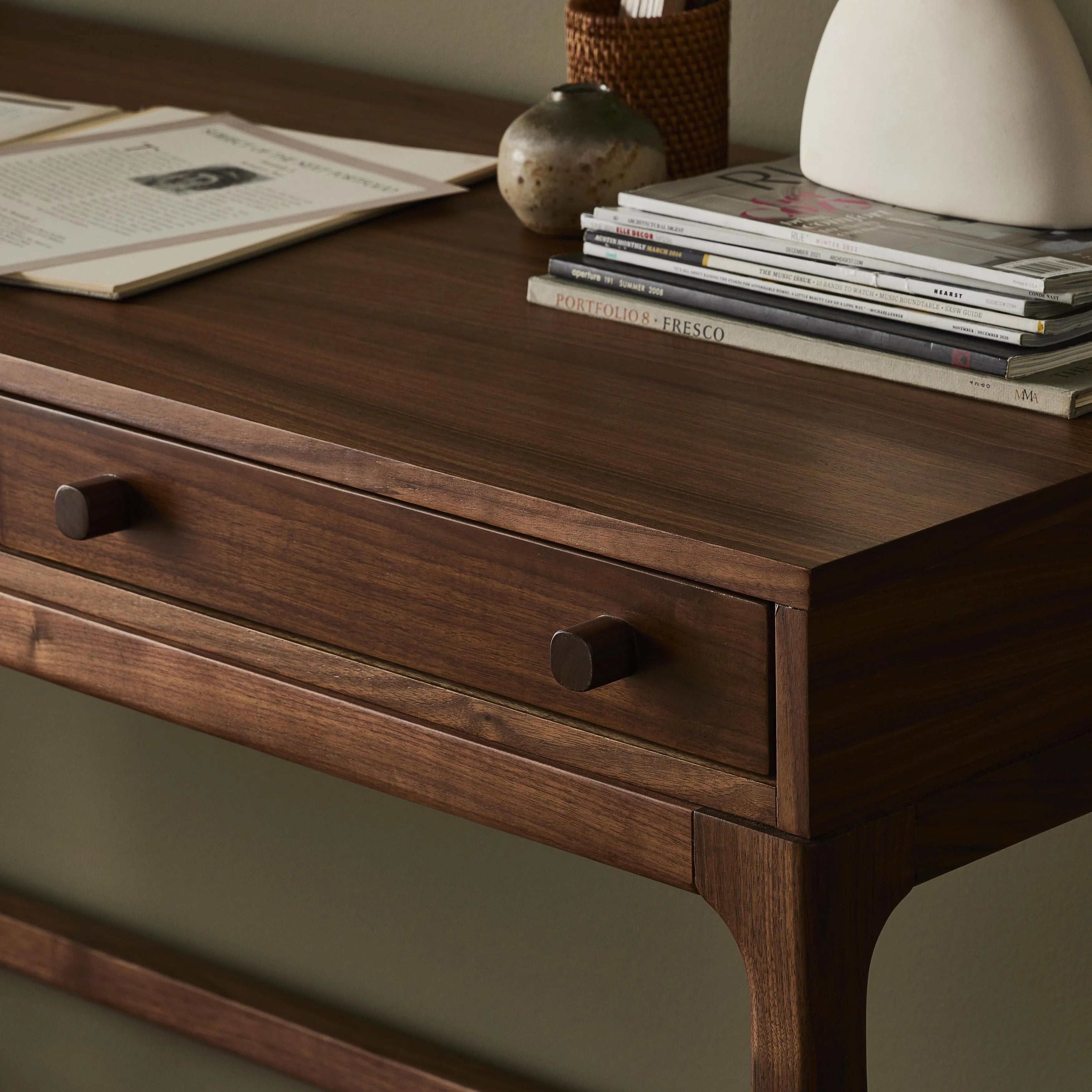 Featuring Arturo Natural Walnut Desk by Four Hands at Amethyst Home. Made from solid walnut in a classic natural finish, a slim-profile desk features three drawers to keep frequently used items on hand.Overall Dimensions: 59.75"W x 22.25"L x 31"H
Collection: WallisColors: Natural WalnutMaterials: Solid Walnut Dimentions: 22.25 in x 59.75 in x 31.0 in We. Amethyst Home provides interior design, new home construction design consulting, vintage area rugs, and lighting in the Newport Beach metro area.