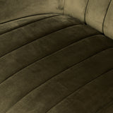 Velvety olive fabric and dramatic channeling make update traditional barrel seating while a hidden 360-degree swivel adds a modern finishing touch. Fabric features subtle highs and lows that change in appearance depending on the direction of the fabric's nap. Amethyst Home provides interior design, new construction, custom furniture, and area rugs in the Austin metro area.