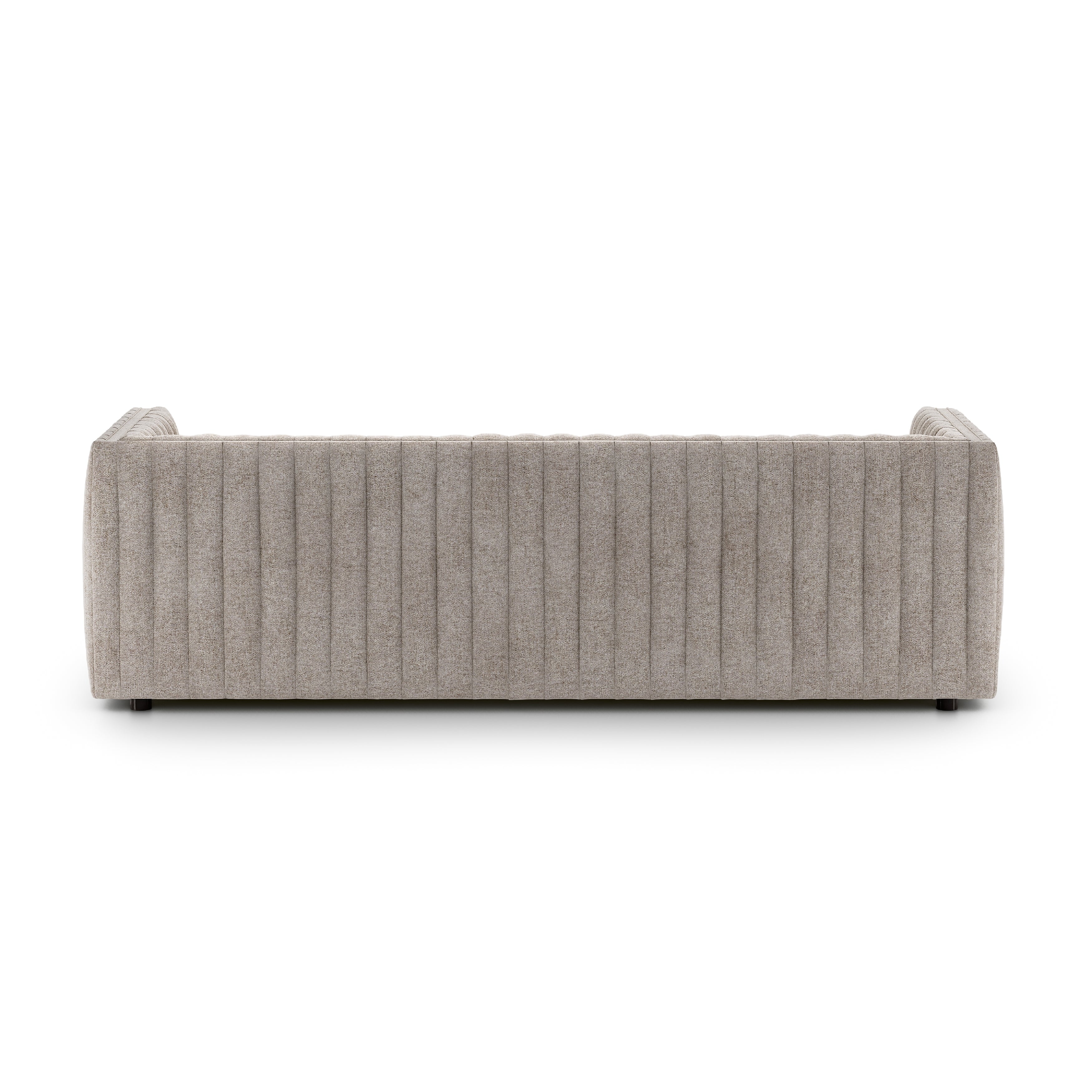 A dramatically channeled sofa with textural grey upholstery offers a clean look inspired by modern menswear. Amethyst Home provides interior design, new construction, custom furniture, and area rugs in the Monterey metro area.