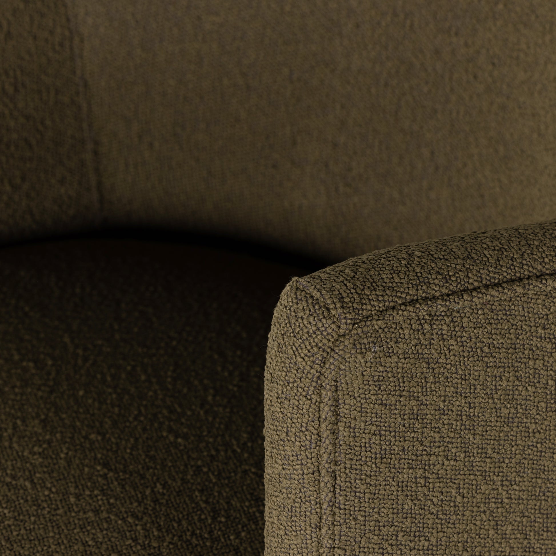 Intriguing while inviting. Drum-style seating is upholstered in a soothing and textural olive boucle. A swivel base of distressed natural parawood places a fresh spin on a feminine form. Performance fabrics are specially created to withstand spills, stains, high traffic and wear, ensuring long-term comfort and unmatched durability. Amethyst Home provides interior design, new construction, custom furniture and area rugs in the Seattle metro area