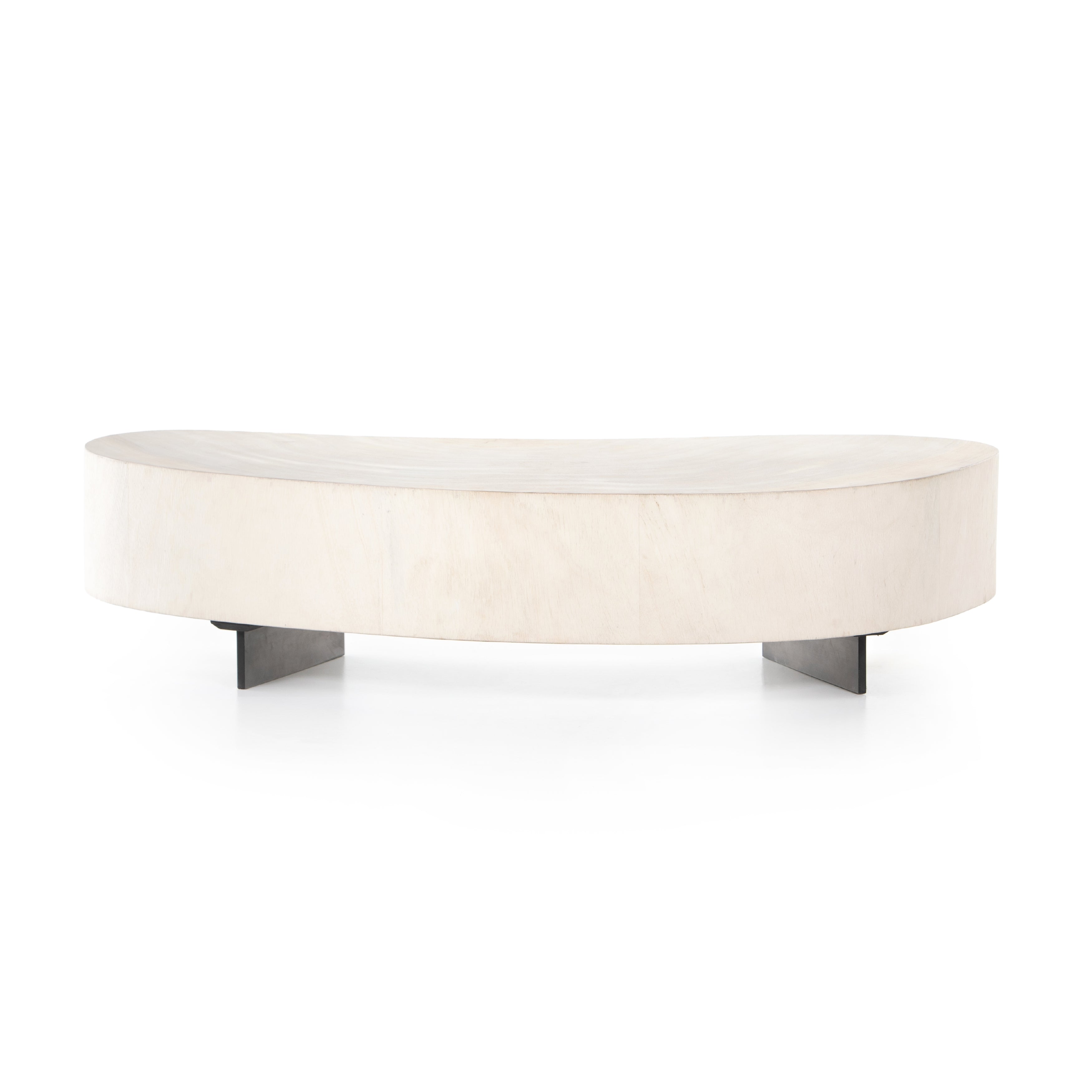 Natural beauty, total novelty. Bleached oyster-cut Guanacaste forms a petite, kidney-shaped coffee table. Visible rings speak to woods' natural graining, while a dark gunmetal-finished base provides clean contrast to the whole look. Short piece; measures 49.5"x24"x11.75". Option to pair with taller piece, sold separately. Amethyst Home provides interior design, new construction, custom furniture, and area rugs in the Calabasas metro area.