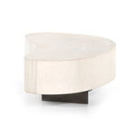 Natural beauty, total novelty. Bleached oyster-cut Guanacaste forms a petite, kidney-shaped coffee table. Visible rings speak to woods' natural graining, while a dark gunmetal-finished base provides clean contrast to the whole look. Short piece; measures 49.5"x24"x11.75". Option to pair with taller piece, sold separately. Amethyst Home provides interior design, new construction, custom furniture, and area rugs in the San Diego metro area.