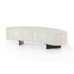 Natural beauty, total novelty. Bleached oyster-cut Guanacaste forms a petite, kidney-shaped coffee table. Visible rings speak to woods' natural graining, while a dark gunmetal-finished base provides clean contrast to the whole look. Short piece; measures 49.5"x24"x11.75". Option to pair with taller piece, sold separately. Amethyst Home provides interior design, new construction, custom furniture, and area rugs in the Washington metro area.