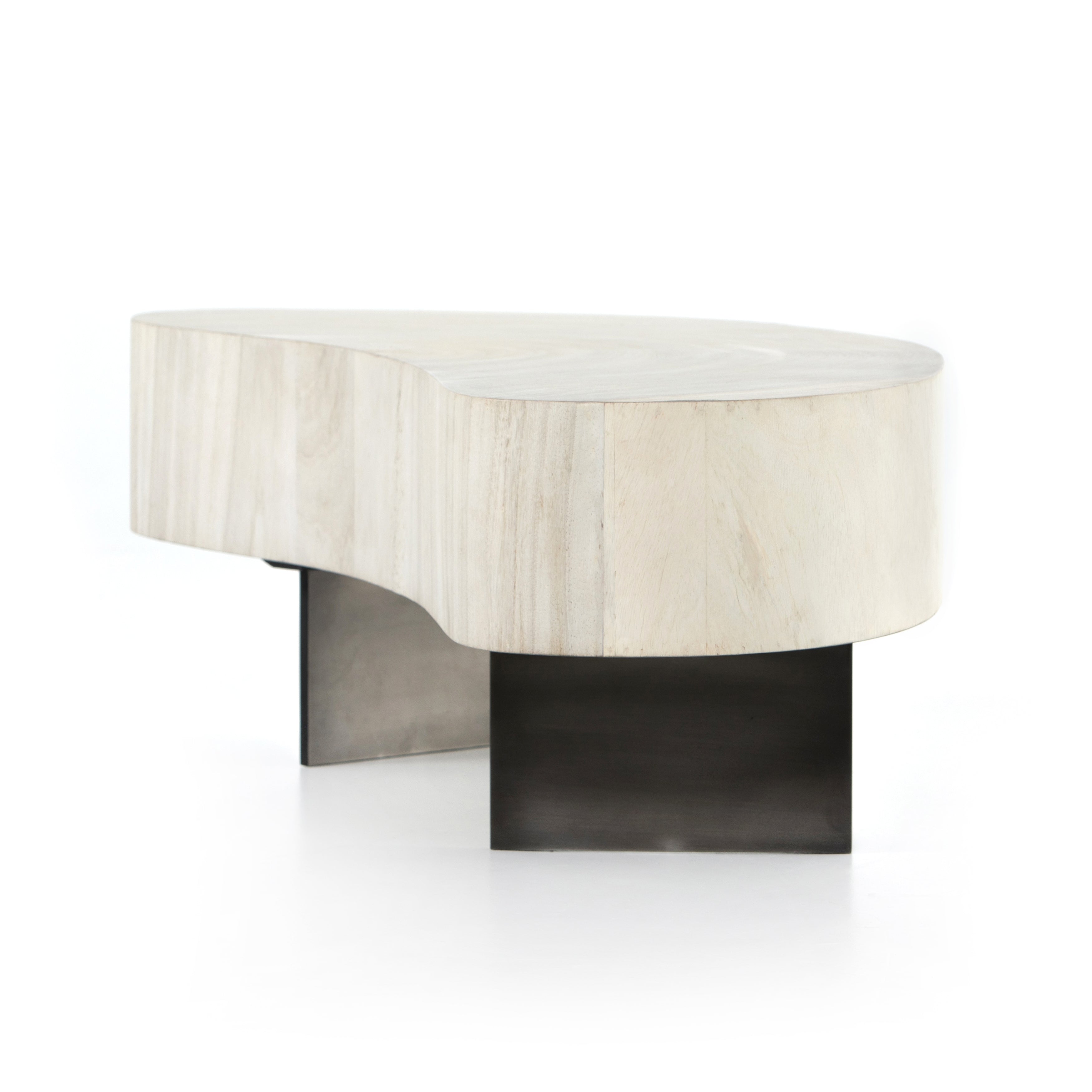 Natural beauty - total novelty. A thick slab of bleached, oyster-cut Guanacaste forms a tall, kidney-shaped coffee table. Visible rings speak to woods' natural graining, while a dark gunmetal-finished base provides clean contrast to the whole look. Amethyst Home provides interior design, new construction, custom furniture, and area rugs in the Des Moines metro area.