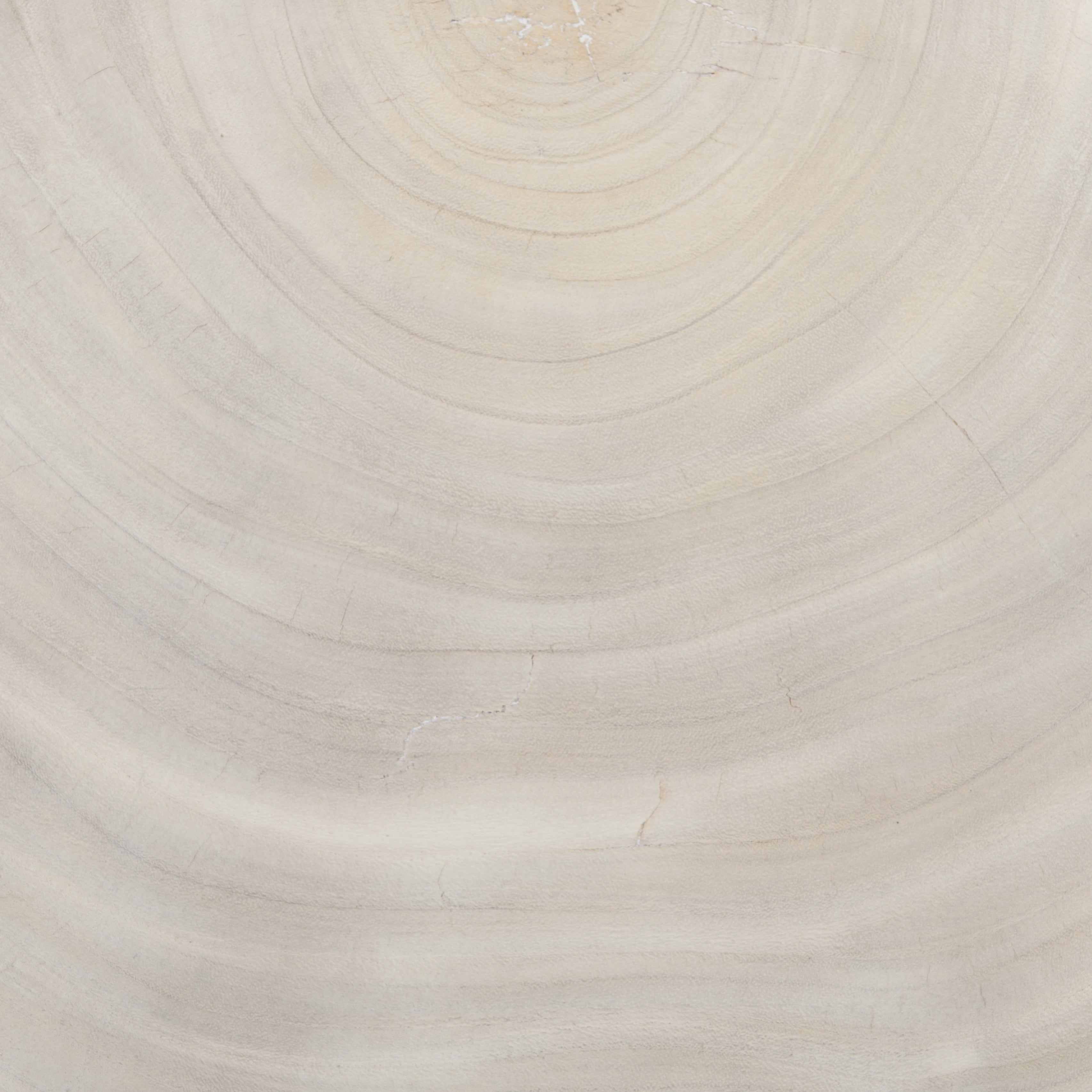 Natural beauty - total novelty. A thick slab of bleached, oyster-cut Guanacaste forms a tall, kidney-shaped coffee table. Visible rings speak to woods' natural graining, while a dark gunmetal-finished base provides clean contrast to the whole look. Amethyst Home provides interior design, new construction, custom furniture, and area rugs in the San Diego metro area.