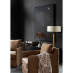 Introducing the Banks Palermo Drift Swivel Chair, the perfect addition to any moody room. Please expect natural distressing, adding character and charm to the chair. Pair it with Sherwin Williams Pewter Green walls and Surya rugs for a cohesive look. Whether you're in Nashville, Florida, or Utah, this chair will seamlessly blend with any modern coastal-inspired home design. Add the Banks Palermo Drift Swivel Chair to your living room or bedroom for a touch of sophistication and comfort.