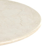Simply sophisticated. A bistro-style table inspired by 1970s Italian design, an ivory-finished iron base supports a rounded tabletop of cream-colored solid marble, for a fresh, monochromatic look that pairs with just about anything. Amethyst Home provides interior design, new construction, custom furniture and area rugs in the Miami metro area