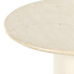 Simply sophisticated. A bistro-style table inspired by 1970s Italian design, an ivory-finished iron base supports a rounded tabletop of cream-colored solid marble, for a fresh, monochromatic look that pairs with just about anything. Amethyst Home provides interior design, new construction, custom furniture and area rugs in the Scottsdale metro area