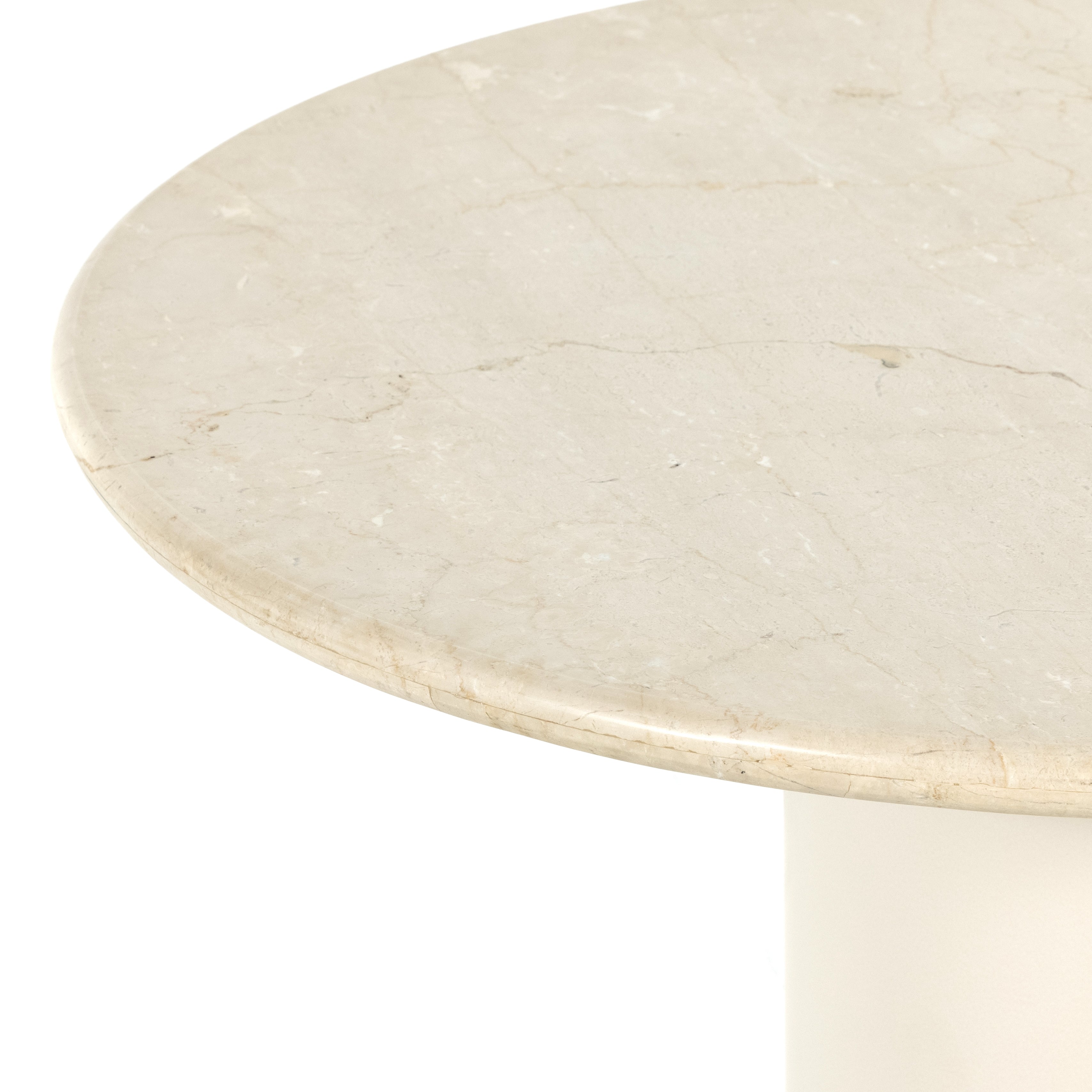 Simply sophisticated. A bistro-style table inspired by 1970s Italian design, an ivory-finished iron base supports a rounded tabletop of cream-colored solid marble, for a fresh, monochromatic look that pairs with just about anything. Amethyst Home provides interior design, new construction, custom furniture and area rugs in the Scottsdale metro area