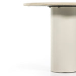Simply sophisticated. A bistro-style table inspired by 1970s Italian design, an ivory-finished iron base supports a rounded tabletop of cream-colored solid marble, for a fresh, monochromatic look that pairs with just about anything. Amethyst Home provides interior design, new construction, custom furniture and area rugs in the Winter Garden metro area
