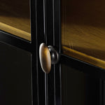Featuring Belmont Black Oak Cabinet by Four Hands at Amethyst Home. Display barware, books and keepsakes in beautifully arched cabinetry. Solid iron sheeting is finished in a soft, matte black with contrasting brass hardware. Glass fronts allow back paneling of light oak veneer to show, for an eye-catching contrast of color.
Collection: BelmontColors: Light Oak Veneer ,Black ,W. Amethyst Home provides interior design, new construction, custom furniture, and area rugs in the Kansas City metro area.