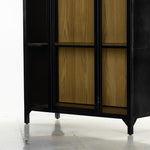 Featuring Belmont Black Oak Cabinet by Four Hands at Amethyst Home. Display barware, books and keepsakes in beautifully arched cabinetry. Solid iron sheeting is finished in a soft, matte black with contrasting brass hardware. Glass fronts allow back paneling of light oak veneer to show, for an eye-catching contrast of color.
Collection: BelmontColors: Light Oak Veneer ,Black . Amethyst Home provides interior design, new construction, custom furniture, and area rugs in the Newport Beach metro area.