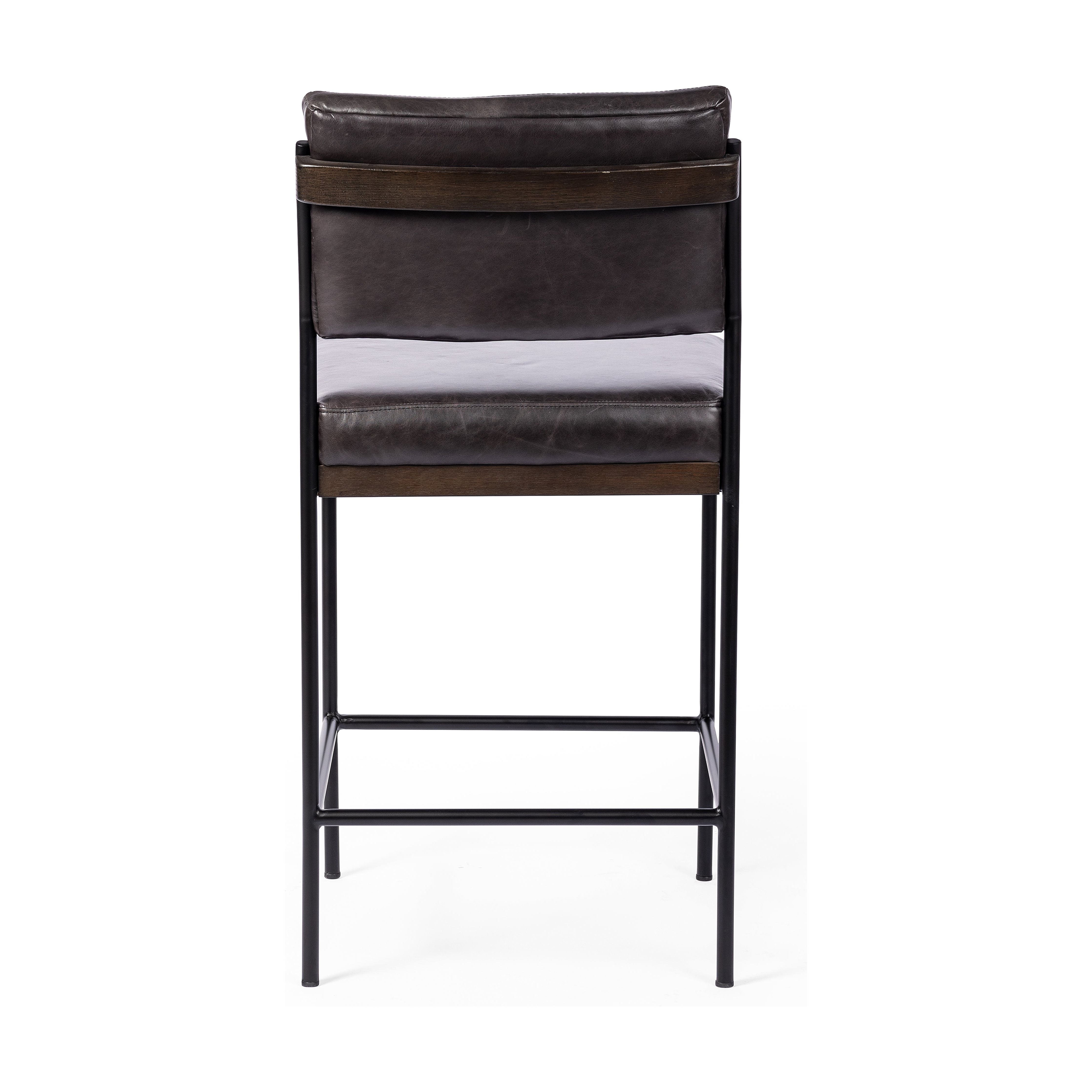 Simple and streamlined with thoughtful details. Slim, black-finished iron frame with solid oak decking, plus black top-grain leather seating for modernity. A stylish staple for any counter. Amethyst Home provides interior design, new construction, custom furniture, and area rugs in the Des Moines metro area.