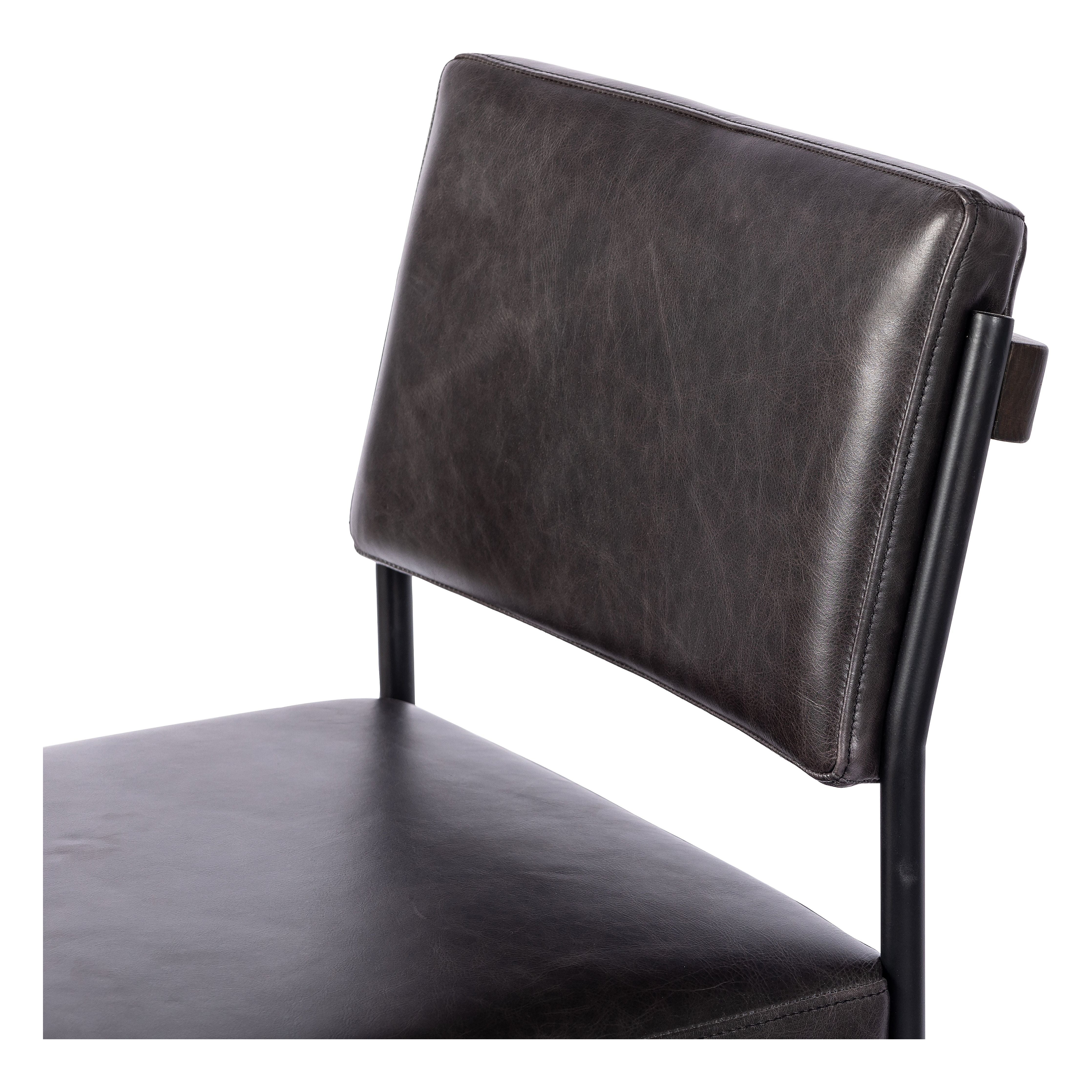 Simple and streamlined with thoughtful details. Slim, black-finished iron frame with solid oak decking, plus black top-grain leather seating for modernity. A stylish staple for any counter. Amethyst Home provides interior design, new construction, custom furniture, and area rugs in the Nashville metro area.