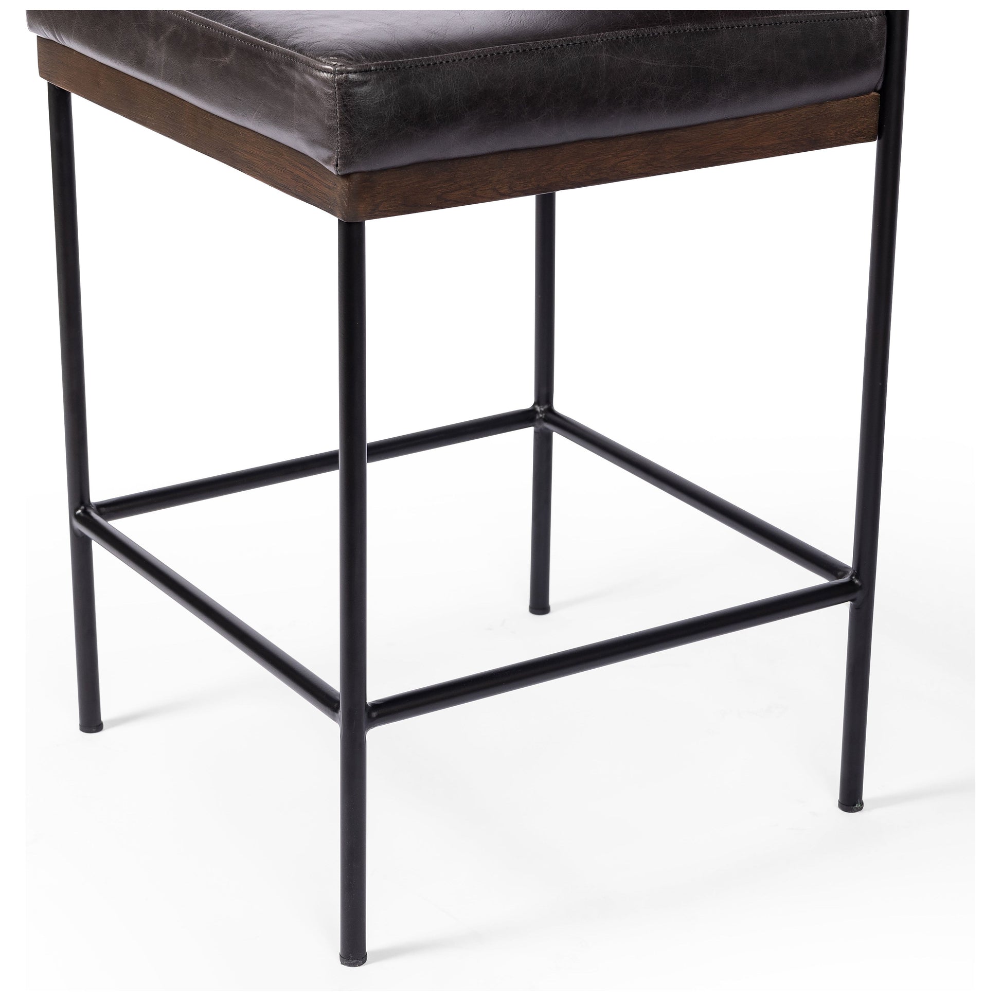 Simple and streamlined with thoughtful details. Slim, black-finished iron frame with solid oak decking, plus black top-grain leather seating for modernity. A stylish staple for any counter. Amethyst Home provides interior design, new construction, custom furniture, and area rugs in the Scottsdale metro area.