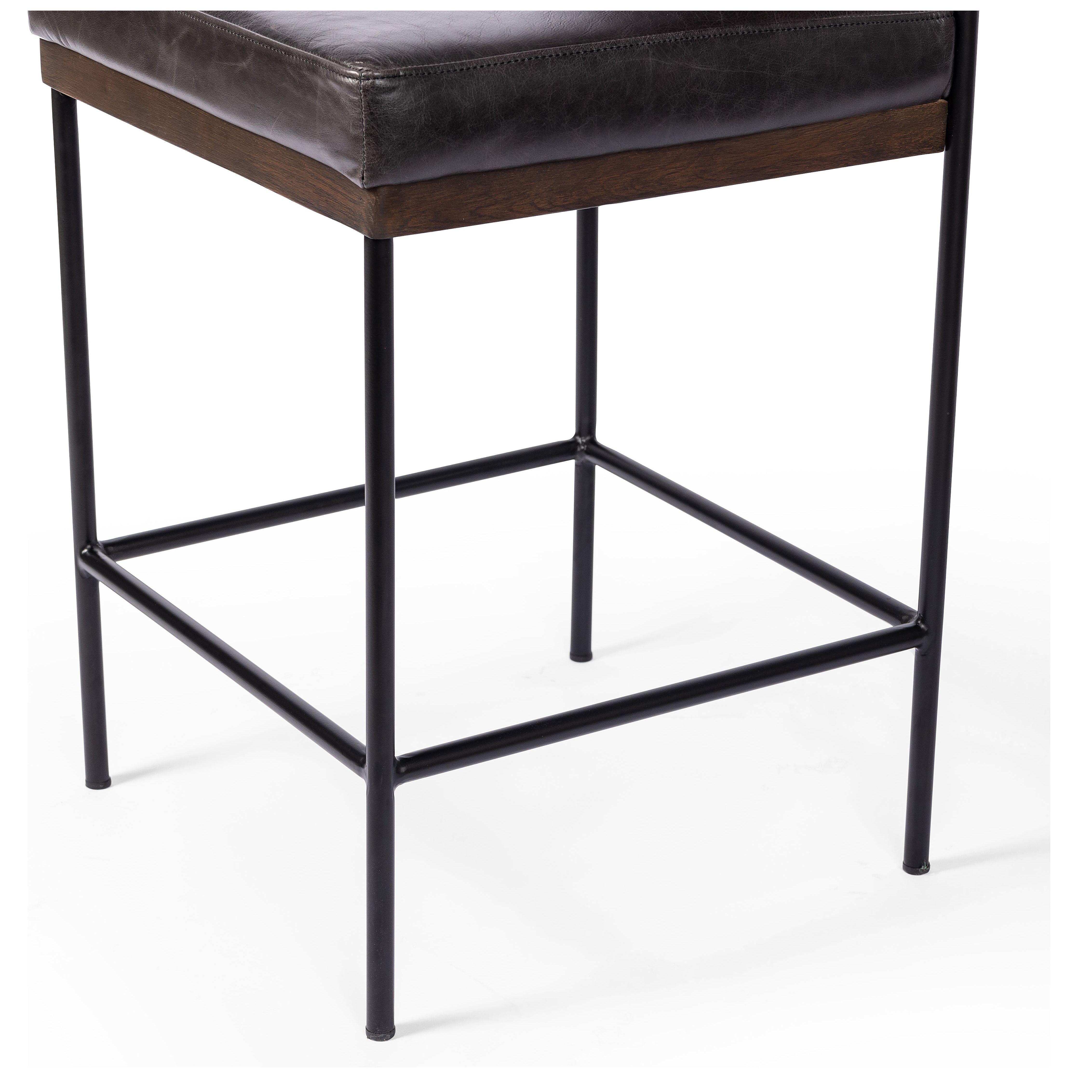 Simple and streamlined with thoughtful details. Slim, black-finished iron frame with solid oak decking, plus black top-grain leather seating for modernity. A stylish staple for any counter. Amethyst Home provides interior design, new construction, custom furniture, and area rugs in the Scottsdale metro area.