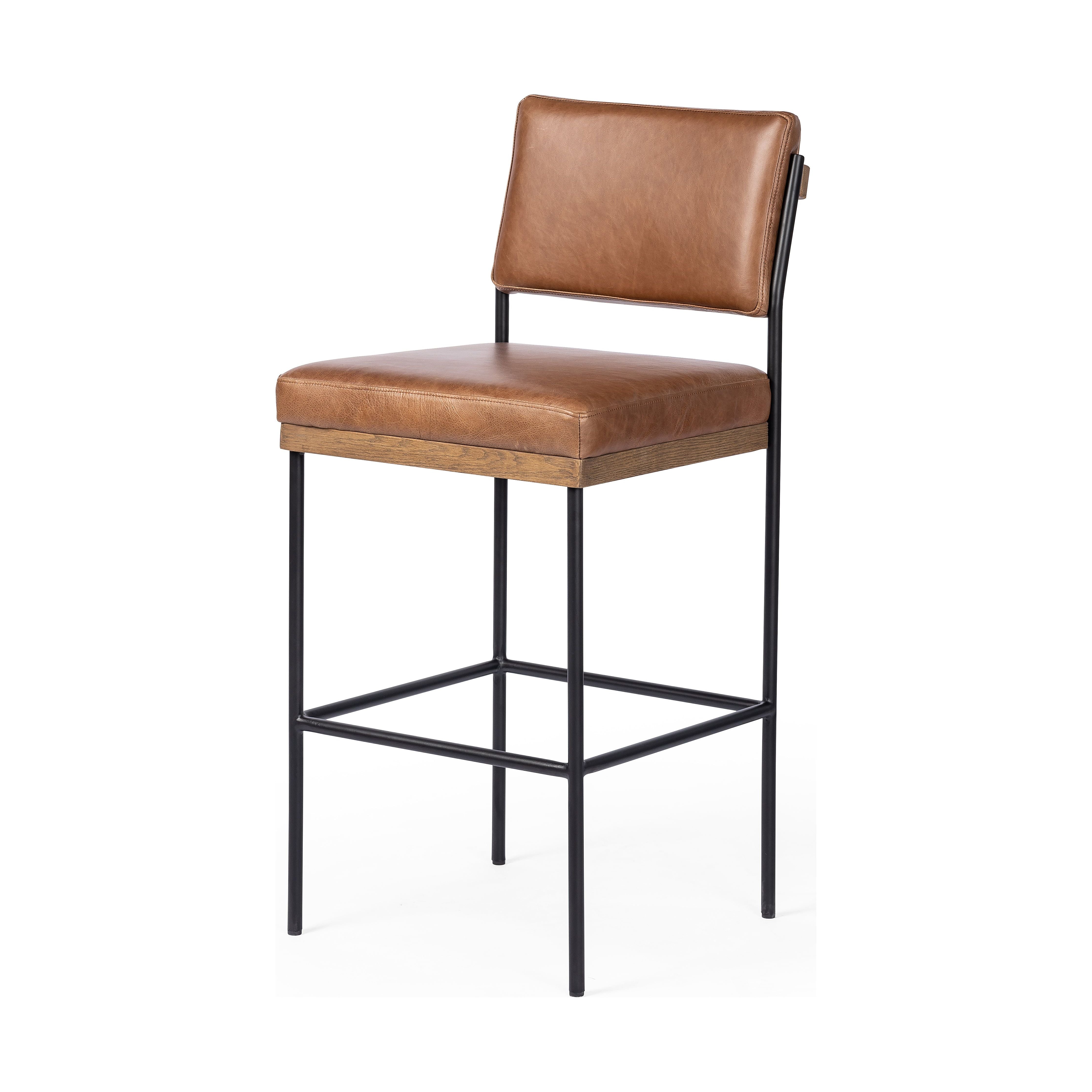 Simple and streamlined with thoughtful details. Slim, black-finished round stock iron solid wood decking, plus tan top-grain leather seating for modernity. A stylish staple for any counter. Amethyst Home provides interior design, new construction, custom furniture, and area rugs in the Boston metro area.